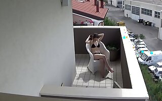 Spying my teen neighbour masturbating on her balcony